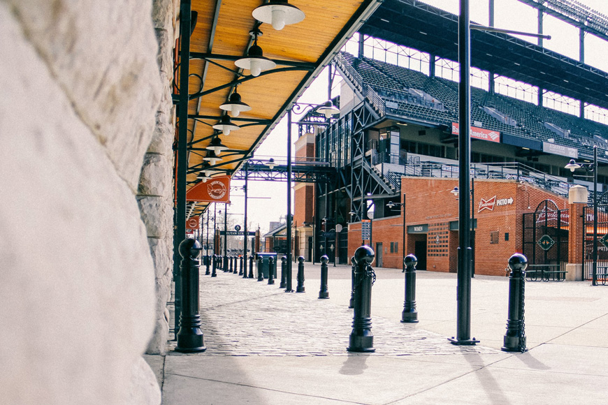 Cast and wrought iron site furnishings enhance red-brick and steel Oriole Park architecture