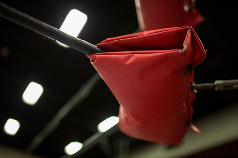 turnbuckles holding cable ropes of a wrestling ring together